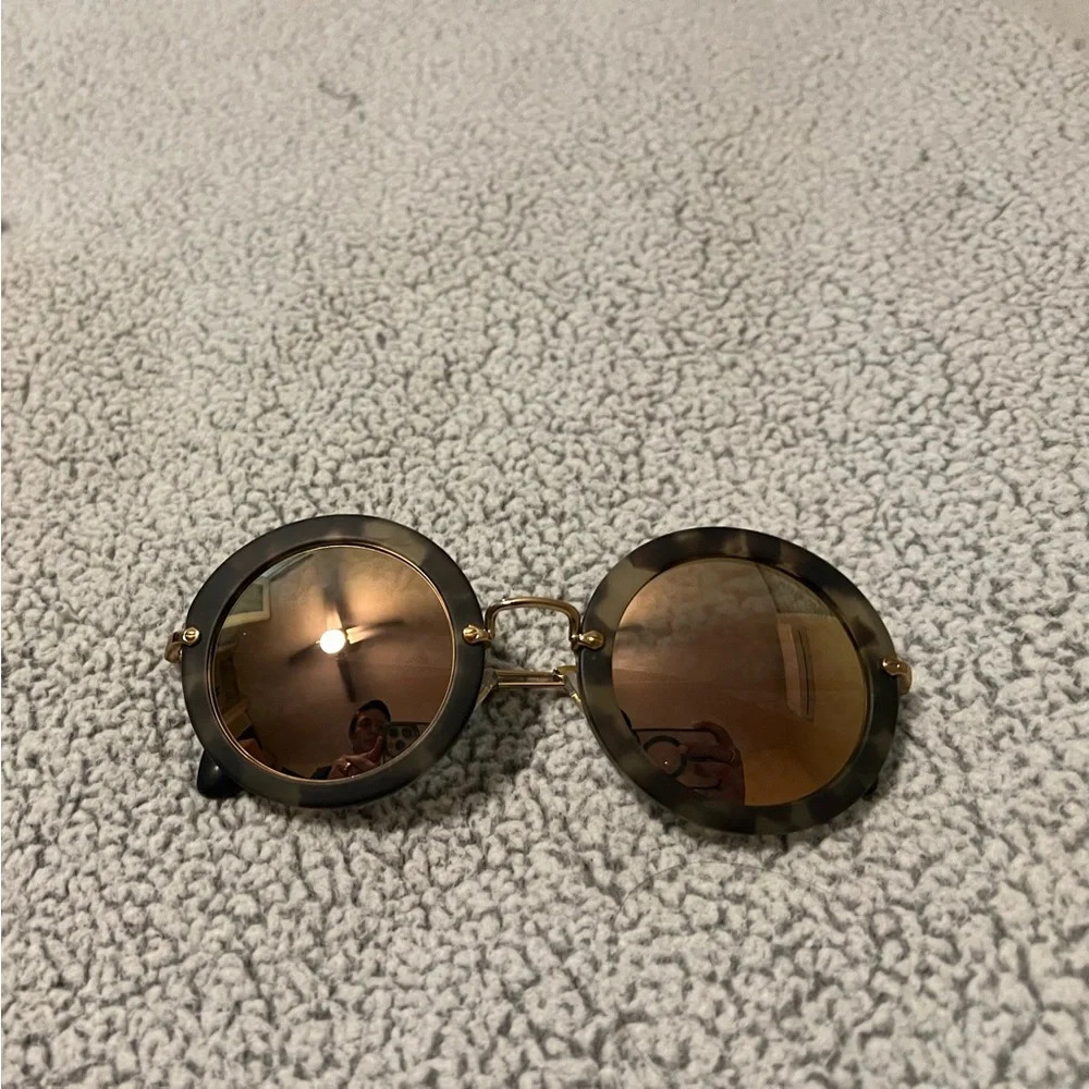 Miu Miu Round Sunglasses with Brown Lenses